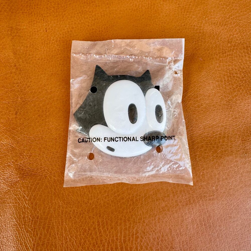 Vintage Felix the Cat plastic brooch New in plastic SUPER RARE